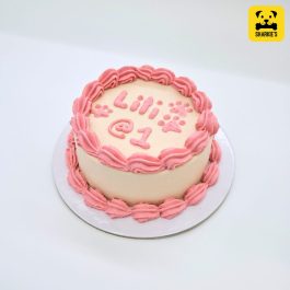 Simple shell boarders pet birthday cake in pink