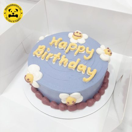 purple smiley flowers pet birthday cake